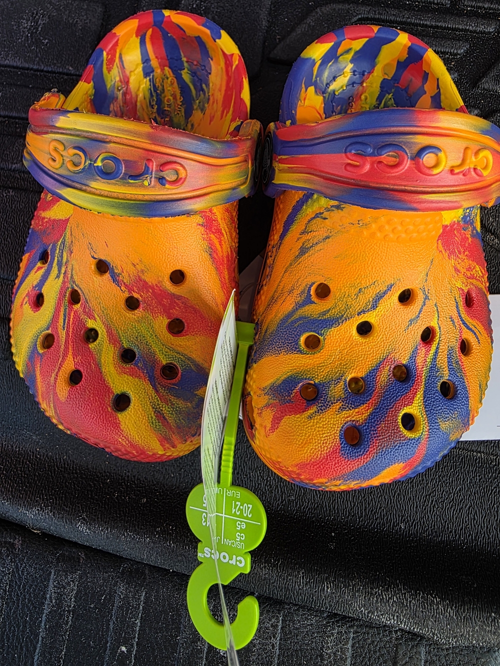 CROCS Kids Multicolor Tie-Dye Clog in Orange, Blue, Red, Yellow